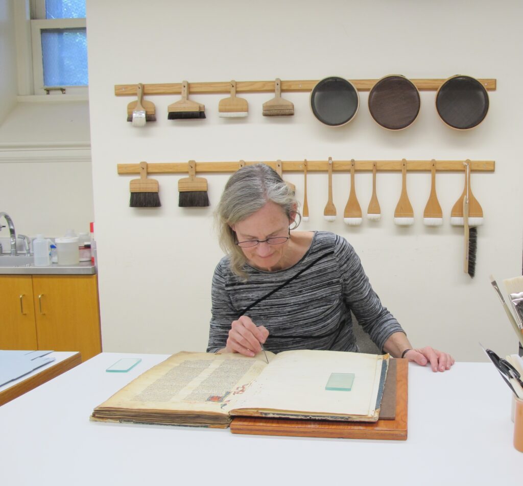 A conservator at the UC Berkeley Library conservation lab.