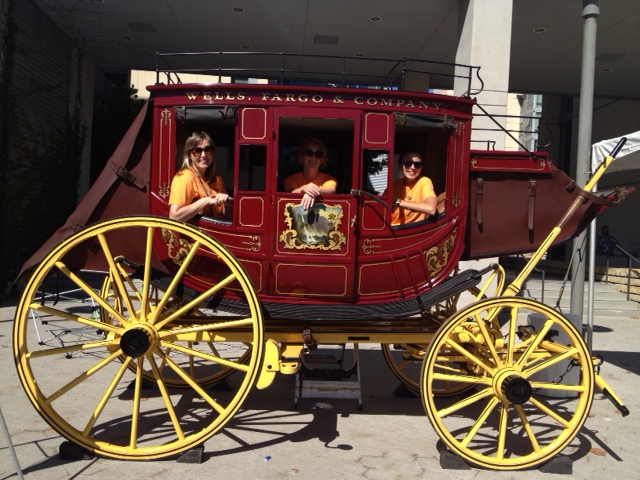 The archives team in a Wells Fargo stagecoach at the Block Party. UCSF founder Hugh Toland reportedly used the company’s services in the mid-nineteenth century to transport pharmaceuticals to patients throughout California.