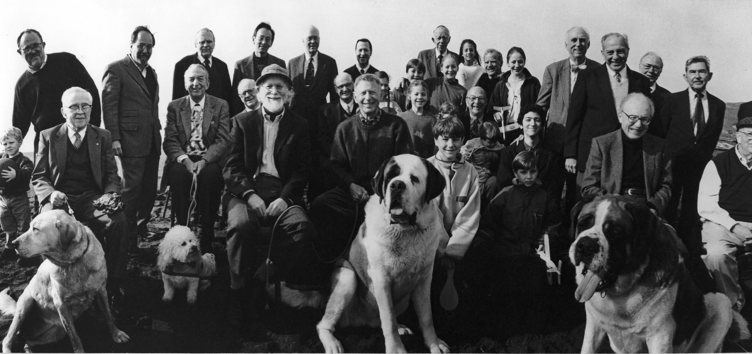 Group photograph of California Nobel Prize winners with family members and dogs. Exhibit files, Bishop.