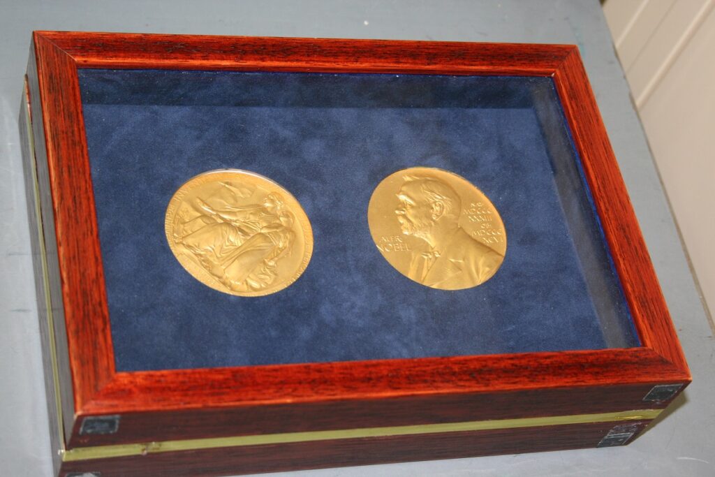 Replicas of Varmus and Bishop Nobel Prize medals. MSS 2007-21.