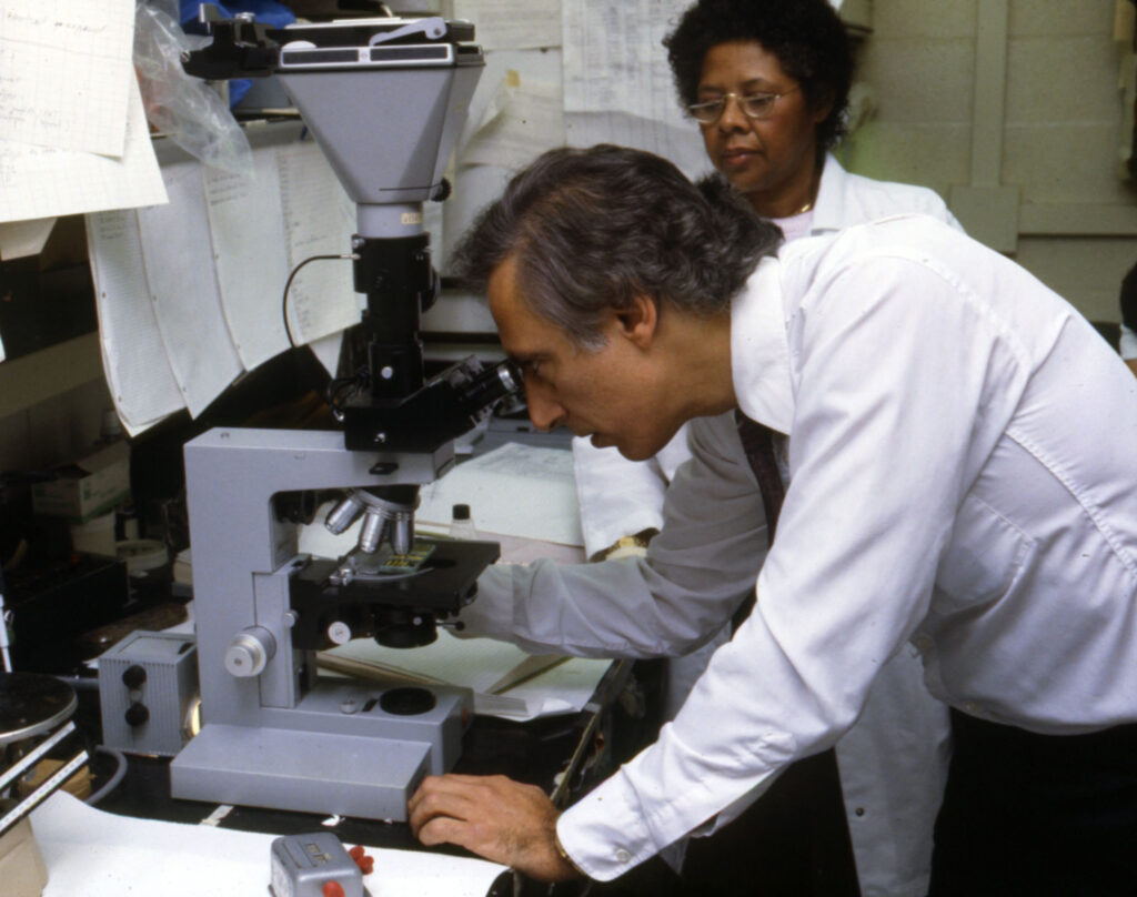 Robert C. Gallo, M.D. at the National Institutes of Health, early 1980’s . Courtesy National Cancer Institute, National Institutes of Health